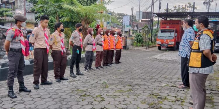 Saka Bhayangkara Ranting Pakem Dirikan Posko Karya Bakti Lebaran 2022